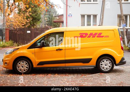 A DHL delivery van is seen in Warsaw, Poland on 01 November, 2022. DHL Global Forwarding, the air and ocean freight specialist of Deutsche Post DHL Gr Stock Photo