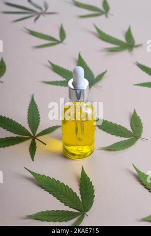 Spoon and cosmetics with hemp extract on light background Stock Photo ...