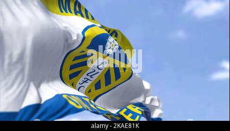 Leeds, UK, Oct. 2022: The Leeds United flag waving in the wind. Leeds United Football Club is an English football club based in Leeds. 3D illustration Stock Photo