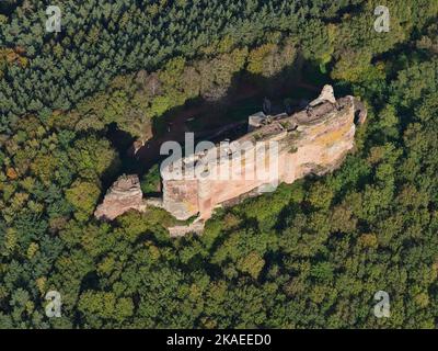 AERIAL VIEW. Ruins of Fleckenstein castle on top of a very narrow and lofty sandstone butte. Lembach, Bas-Rhin, Alsace, Grand Est, France. Stock Photo