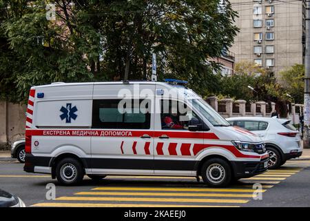 Kyiv, Ukraine - November 02, 2022 Ambulance rolling in the city center of kyiv during the war with Russia, kyiv are the target of Russian missiles and Stock Photo