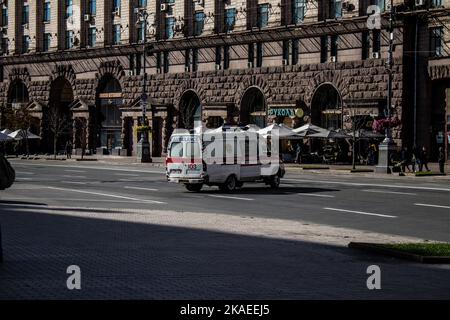 Kyiv, Ukraine - November 02, 2022 Ambulance rolling in the city center of kyiv during the war with Russia, kyiv are the target of Russian missiles and Stock Photo