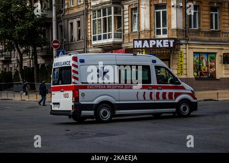 Kyiv, Ukraine - November 02, 2022 Ambulance rolling in the city center of kyiv during the war with Russia, kyiv are the target of Russian missiles and Stock Photo