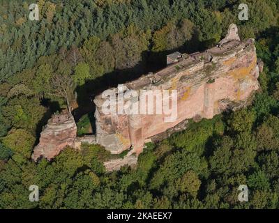 AERIAL VIEW. Ruins of Fleckenstein castle on top of a very narrow and lofty sandstone butte. Lembach, Bas-Rhin, Alsace, Grand Est, France. Stock Photo