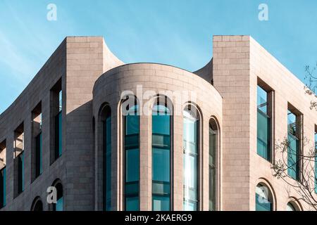 Madrid, Spain - September 24, 2022: Office building in Emilio Castelar Square in Castellana Avenue. Stone and glass facade Stock Photo
