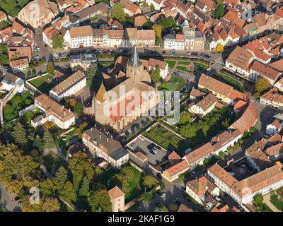 AERIAL VIEW. St. Peter and St. Paul's Church in the historic center of Wissembourg. Bas-Rhin, Alsace, Grand Est, France. Stock Photo