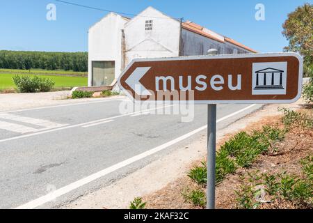 A direction sign on an old rice husking factory Museu do Arroz in Comporta village in Portugal Stock Photo