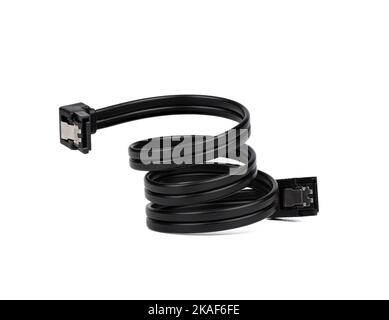 Black cable twisted into a spiral with SATA connectors on a white background. Copy space. Stock Photo