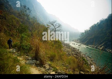 Trail on the Sarda river gorge at India/Nepal border. This trek was made famous by Jim Corbett in his book Maneaters of Kumaon, Uttarakhand, India Stock Photo