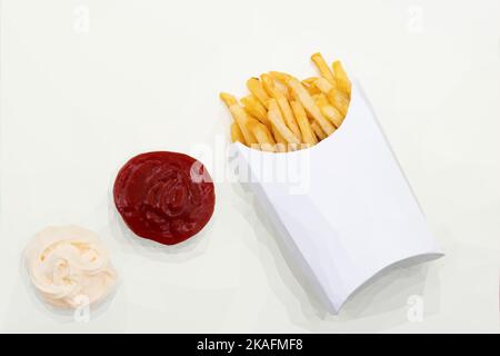 french fries in paper box with ketchup and mayonnaise. Vector in Low Poly Style. Stock Vector