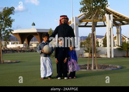 Taif Saudi Arabia Children & Father In Gardens Stock Photo