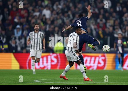 Turin, Italy. 02nd Nov, 2022. Marquinhos of Paris Saint-Germain and Alex Sandro of Juventus Fc Fc battle for the ball during the Uefa Champions League Group H match beetween Juventus Fc and Paris Saint-Germain Fc at Allianz Stadium on November 2, 2022 in Turin, Italy . Credit: Marco Canoniero/Alamy Live News Stock Photo