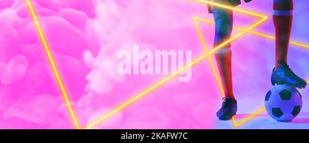 Low section of african american man with leg on ball and illuminated triangle shapes over smoke Stock Photo