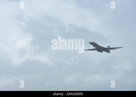 A U.S. Air Force B-1B Lancer assigned to the 37th Expeditionary Bomb Squadron, Ellsworth Air Force Base, South Dakota, takes off in support of a Bomber Task Force Mission at Andersen AFB, Guam, Oct. 29, 2022. Training outside the United States enables aircrew and Airmen to become familiar with other theaters and airspace, and enhances the enduring skills and relationships necessary to confront a broad range of global challenges in support of the National Defense Strategy. (U.S. Air Force photo by Senior Airman Yosselin Campos) Stock Photo