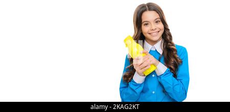 Happy child hold yellow plastic bottle with vegetarian liquid food for breakfast, smoothie. Horizontal poster of isolated child face, banner header Stock Photo