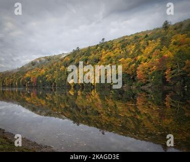 Cloudy autumn sky over the Mongaup River Stock Photo