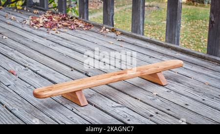Persian shena push up board on a backyard wooden deck Stock Photo