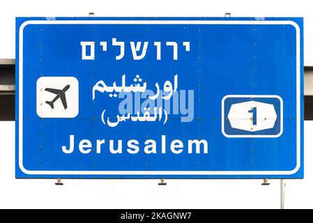 Jerusalem direction sign on Highway 1 in Tel Aviv, Israel Blue road sign for Ben Gurion Airport Exit to the first highway. High quality photo Stock Photo