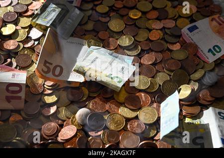 Berlin, Germany. 02nd Nov, 2022. Banknotes and coins are in a collection box made of plexiglass. Credit: Soeren Stache/dpa/Alamy Live News Stock Photo