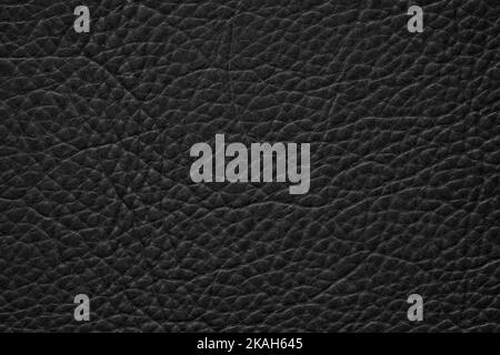 black leather background, patterned texture of animal skin Stock Photo