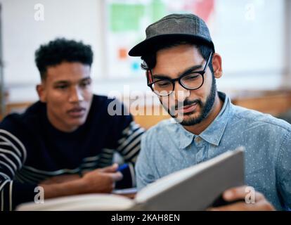 Studying means you trying. university students studying together in class. Stock Photo