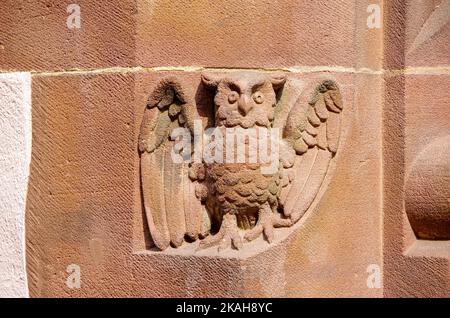 Owl carved in stone on the round arch of a window of the New Town Hall in Rathausgasse, Freiburg, Baden-Wurttemberg, Germany. Stock Photo