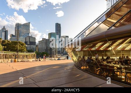 Sydney CBD and the Bennelong Restaurant inside the Sydney Opera House Stock Photo