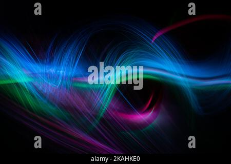 Wave of energy light with elegant glowing lines. Abstract technology background. Stock Photo