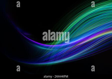 Abstract background neon light wave stripes on black. Stock Photo