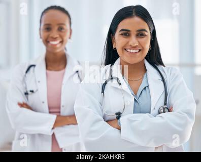 Leadership, teamwork and women doctors in partnership at hospital, proud, happy and excited for medical innovation. Health, team and portrait with Stock Photo