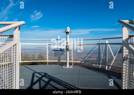 Viewing platform with telescope on Szyndzielnia Mountain in Bielsko-Biala, Poland. Railing and protection of observation tower deck. Peak of thees and Stock Photo