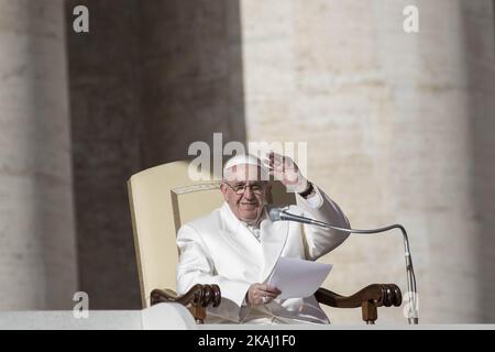 Pope Francis greets the faithful during his Weekly General Audience in St. Peter's Square in Vatican City, Vatican on February 10, 2016. Pope Francis has asked for prayers for his forthcoming meeting with his dear brother, the Patriarch Kirill of Moscow, Head of the Russian Orthodox Church. Stock Photo