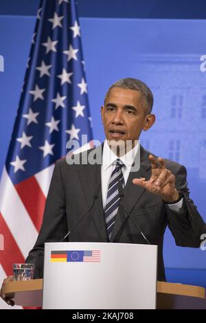 US President Barack Obama is pictured during a news conference held with German Chancellor Angela Merkel at the Herrenhausen Palace in Hanover, Germany on April 24, 2016. The President is currently on a two days visit to Germany where he will attend with German Chancellor Angela Merkel the opening ceremony of the Hannover Messe and meet the Italian Prime Minister Matteo Renzi, the French President Fracois Hollande and the British Prime Minister David Cameron. (Photo by Emmanuele Contini/NurPhoto) *** Please Use Credit from Credit Field *** Stock Photo