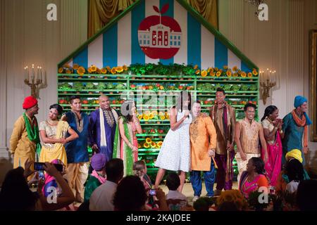 On Thursday, July 14, in the East Room of the White House, First Lady Michelle Obama joins the cast from Walt Disney World Resort’s The Jungle Book: Alive with Magic! after their performance at the 2016 Kids State Dinner.   Stock Photo