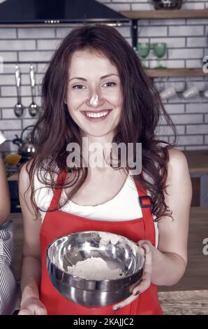 Woman baking powder nose cooking pie cake cookies, bakery concept Stock Photo