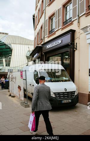 Strasbourg, France - Oct 28, 2022: Male passing near Poulaillon cafe restaurant bakery in reconstruction - French invenot chain of Moricette Stock Photo