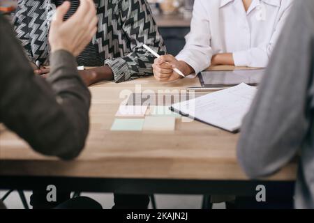group of employees discussing a new business plan. close-up. Stock Photo