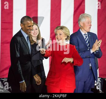 U.S. Presidential hopeful Hillary Clinton, walks the stage greeting the crowd with by her side (l-r), President Barack Obama, Chelsea Clinton, and former President Bill Clinton, after speaking at a GOTV Rally on Independence Mall on November 7, 2016 in Philadelphia, Pennsylvania.  (Photo by Cheriss May/NurPhoto) *** Please Use Credit from Credit Field *** Stock Photo