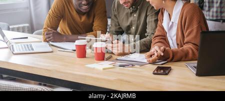 business team using a digital tablet at work in a coworking cent Stock Photo