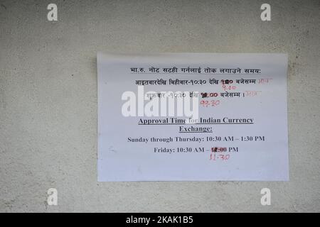 A Stick notice of approval time for Indian currency exhange at Nepal Rastra Bank - Central Bank of Nepal, Kathmandu, Nepal on Friday, December 16, 2016. Nepal Rastra Bank - Central Bank of Nepal is the only bank to exchange Nepalese currency into indian currency in Nepal. (Photo by Narayan Maharjan/NurPhoto) *** Please Use Credit from Credit Field *** Stock Photo