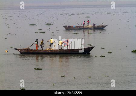 Brave fishermen of Bhola, Bangladesh on 31 December 2016. Bhola is a southern coastal district of Bangladesh, agriculture and fishing are two major profession for the people of Bhola. Fishermen are preparing their net and boat to go to the mighty river Meghna one of the most fierce river of Bangladesh.(Photo by Khandaker Azizur Rahman Sumon/NurPhoto) *** Please Use Credit from Credit Field *** Stock Photo