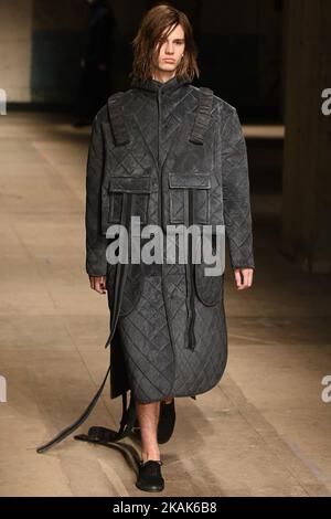 A model walks down the catwalk wearing Craig Green's AW17 collection during London Menswear Fashion Week on January 6, 2017 in London, United Kingdom. (Photo by Karyn Louise/NurPhoto) *** Please Use Credit from Credit Field *** Stock Photo