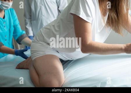 Child birth process, helping personal during labour Stock Photo