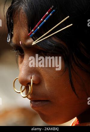 Indigenous Dongria caste tribes look near to their temporary traditional huts as they are preparing it ahead of an annual Tribal Fair, scheduled to starts on the Republic Day of India in the eastern Indian city Bhubaneswar, India, Saturday, 21 January 2017. These Dongria caste tribes live inside the Niyamgiri hills of Kalahandi district of Odisha state in India. (Photo by NurPhoto) *** Please Use Credit from Credit Field *** Stock Photo