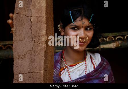 Indigenous Dongria caste tribes look near to their temporary traditional huts as they are preparing it ahead of an annual Tribal Fair, scheduled to starts on the Republic Day of India in the eastern Indian city Bhubaneswar, India, Saturday, 21 January 2017. These Dongria caste tribes live inside the Niyamgiri hills of Kalahandi district of Odisha state in India. (Photo by NurPhoto) *** Please Use Credit from Credit Field *** Stock Photo