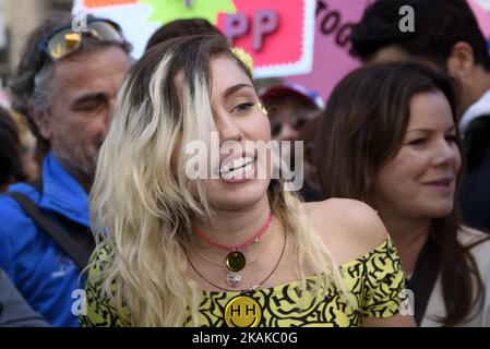 Singer Miley Cyrus during Women's March in Los Angeles, California on January 21, 2017. An estimated crowd of 750,000 people marched to protest President Donald Trump. This was one of hundreds of similar marches held around the world one day after Trump's inauguration. (Photo by Ronen Tivony/NurPhoto) *** Please Use Credit from Credit Field *** Stock Photo