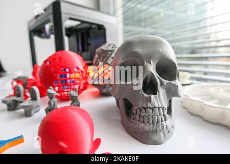 3D printed skull and toys standing in front of 3D printer are seen in Pomeranian Science and Technology Park on 27 January 2017 in Gdynia, Poland. During the conference, industry professionals, presented what is 3D printing, and what for is it, and how to compose own, low-cost kit for home 3D printing. There were also presented professional 3D printing systems in the most popular techniques, ie .: SLS and Poly Jet. (Photo by Michal Fludra/NurPhoto) *** Please Use Credit from Credit Field *** Stock Photo