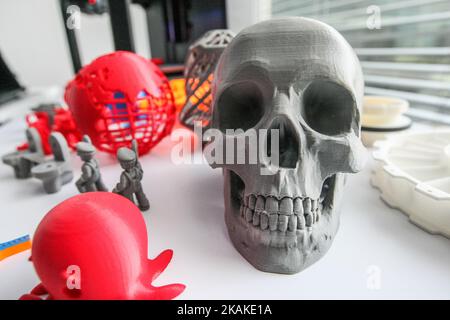 3D printed skull and toys standing in front of 3D printer are seen in Pomeranian Science and Technology Park on 27 January 2017 in Gdynia, Poland. During the conference, industry professionals, presented what is 3D printing, and what for is it, and how to compose own, low-cost kit for home 3D printing. There were also presented professional 3D printing systems in the most popular techniques, ie .: SLS and Poly Jet. (Photo by Michal Fludra/NurPhoto) *** Please Use Credit from Credit Field *** Stock Photo