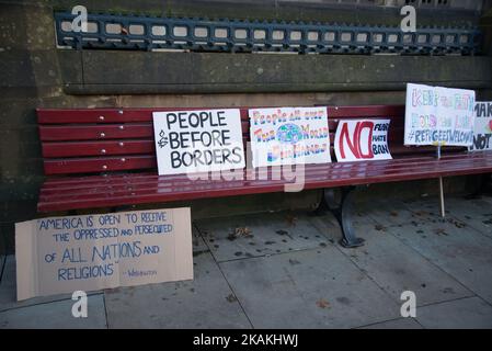 Placards at an anti-Trump Â‘Muslim BanÂ’ demonstration on Saturday Feb. 4, 2017 in Manchester, United Kingdom. The demonstration, which happened in solidarity with other demonstrations in other cities, was prompted by President Trump signing an executive order halting the entire US refugee programme and banning anyone from Iran, Iraq, Libya, Somalia, Sudan, Syria and Yemen as well as people with dual nationality. (Photo by Jonathan Nicholson/NurPhoto) *** Please Use Credit from Credit Field *** Stock Photo