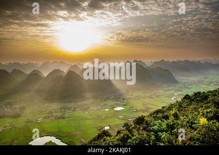 The Bac Son valley under a cloudy sky in Lang Son province, Vietnam Stock Photo